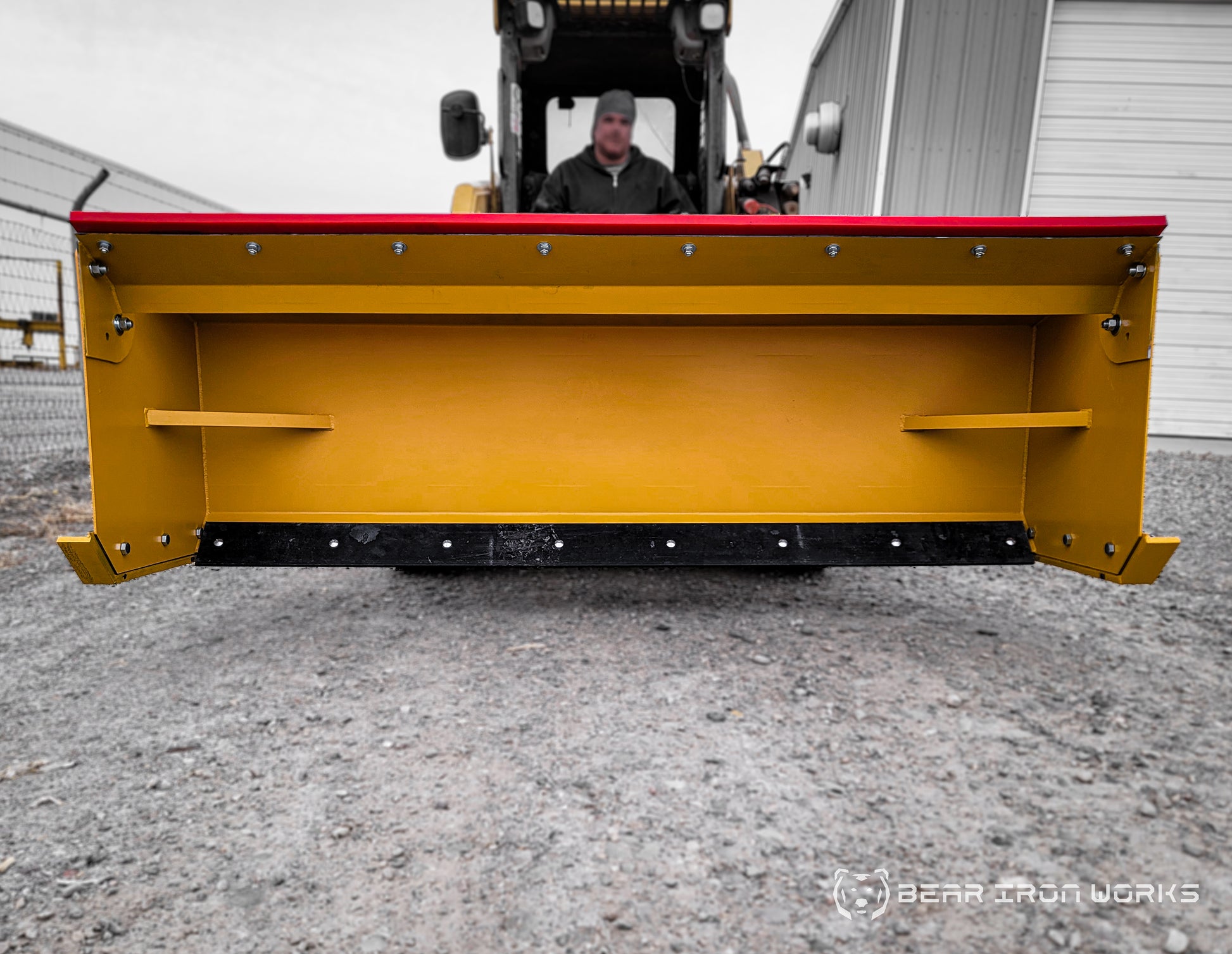 snow pusher attachment for skid steers