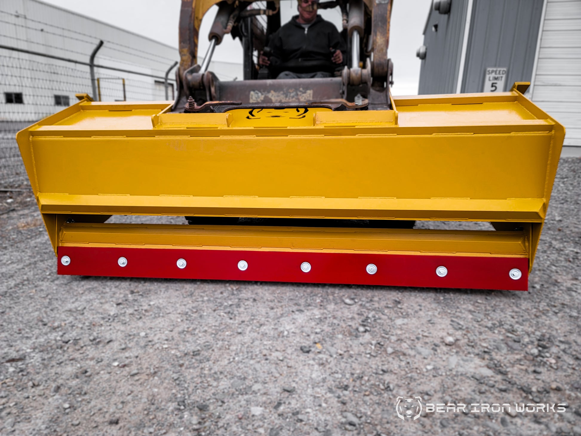 snow pusher attachment for skid steers