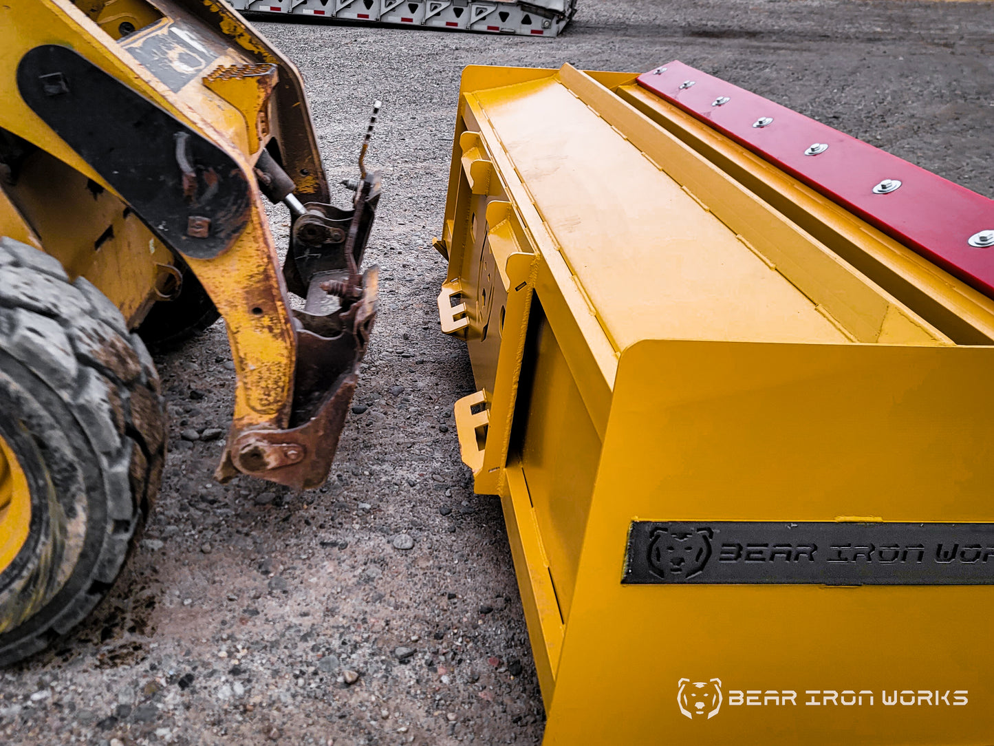 snow pusher attachment for skid steers